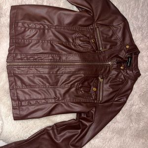 Brown leather jacket, size L. Only wear it 1 time.